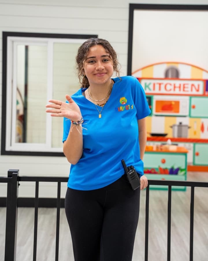 A friendly Play City team member
